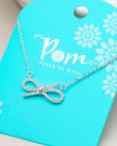 Silver Plated Gift Bow Necklace With Crystals