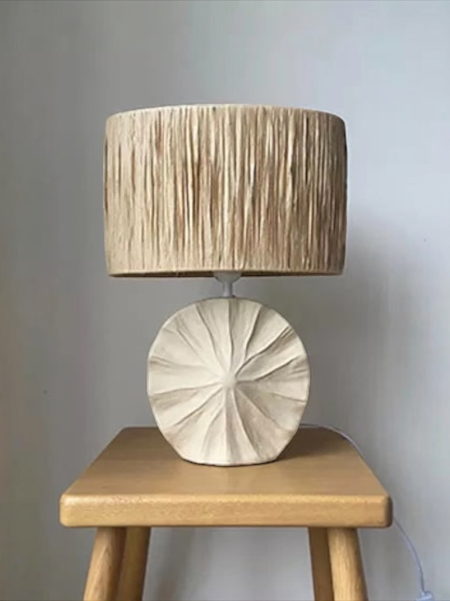 Beige Stone Effect Ceramic Table Lamp With Raffia Shade