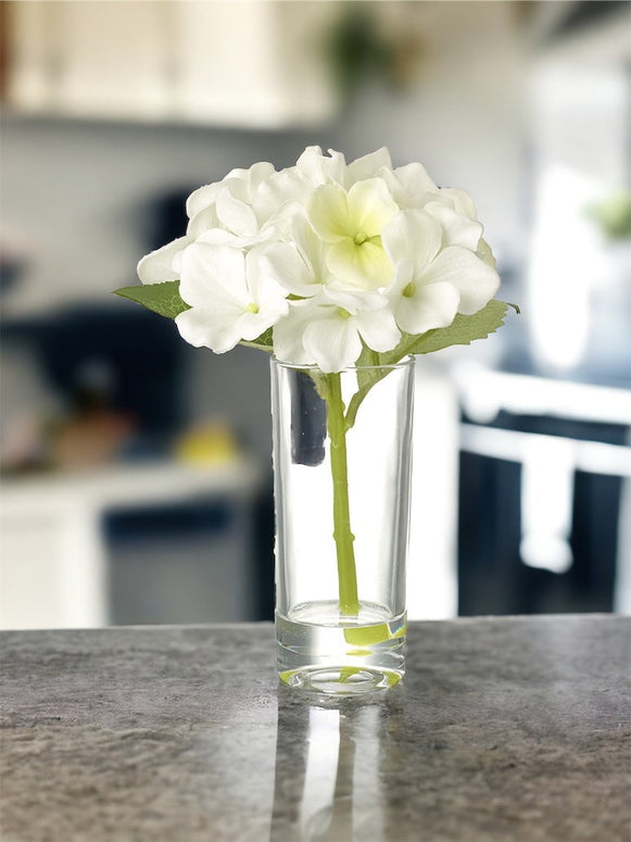 Faux Foliage- Small White Hydrangea Stem In A Clear Glass Vase